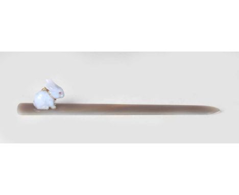 A late 19th/early 20th century Fabergé style carved hardstone paperknife, the tapered blade with a finely carved rabbit mount