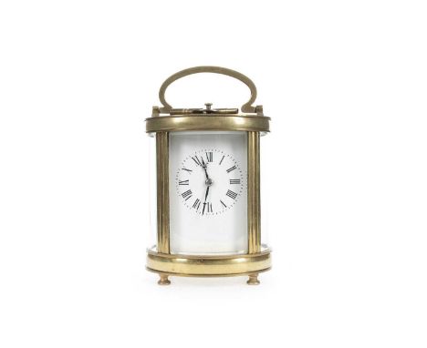 OVAL REPEATER CARRIAGE CLOCK LATE 19TH CENTURY with twin drum eight day movement, the white enamel dial with Roman numerals, 