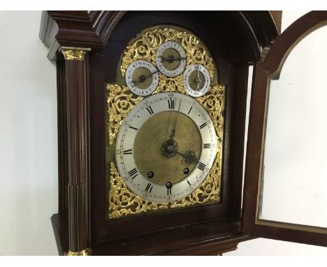 MAHOGANY GRANDMOTHER CLOCK OF 18TH CENTURY DESIGN with three train eight day movement, the brass dial with silvered Roman and