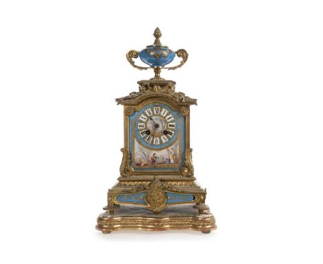 FRENCH ORMOLU AND PORCELAIN MANTEL CLOCK LATE 19TH CENTURY with two train eight day movement, the dial set with Roman numeral