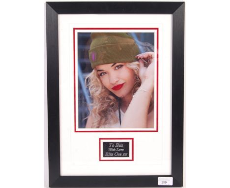 Rita Ora -&nbsp;English singer, songwriter and actress - colour autographed 8x10" photograph. Signed in black ink across a li