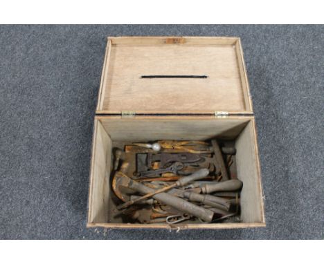 A hand painted wooden ballot box and a small quantity of hand tools 