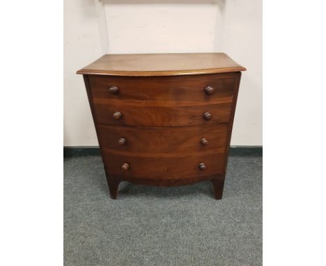 A 19th century bow-fronted mahogany commode chest, width 66 cm 