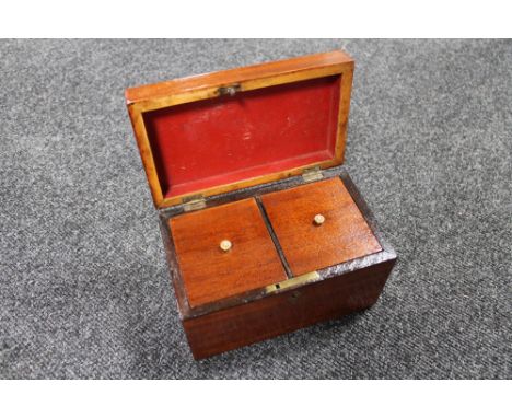 A Victorian mahogany tea caddy 