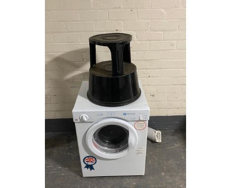 A White Knight bench top dryer and a stool step 