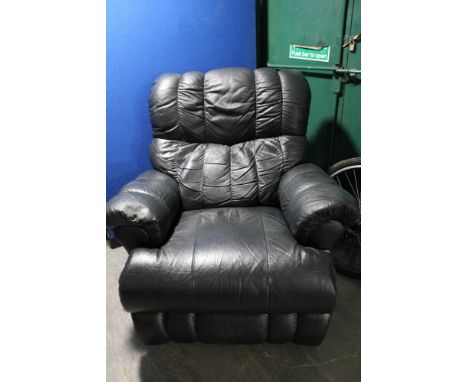 A black leather manual reclining Laz-y-Boy armchair 