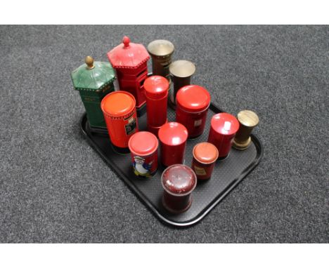 A tray of ceramic, tin and plastic money boxes in the form of post boxes 