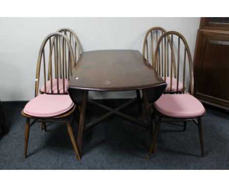 A six piece Ercol dining room suite comprising sideboard, elm drop leaf table and four chairs 