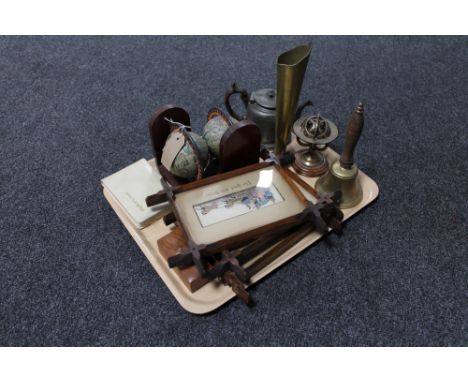 A tray containing antique pewter teapot, brass hand bell, fluted vase and armillary sphere, globe bookends, three oak framed 