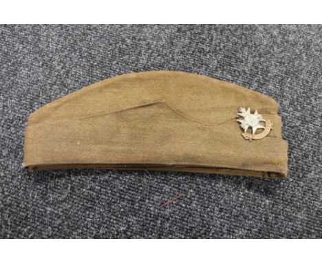 An army hat with Notts. &amp; Derby regiment badge 