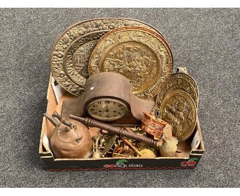 A box of copper and brass embossed plaques and trays, 1930's oak cased mantel clock, part hooka pipe, copper kettle etc 