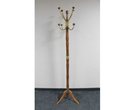 A contemporary wooden and brass hat &amp; coat stand 