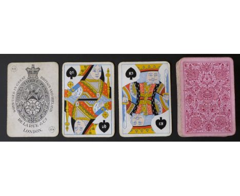 De La Rue & Co, London playing cards. Standard double ended courts,round corners, indices within suit signs. Pink floral back