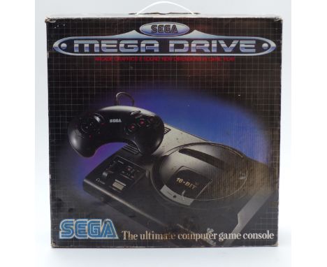 Sega Mega Drive video games console, in original box.&nbsp;
