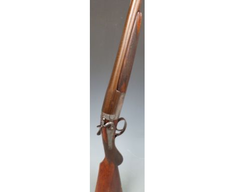 Unnamed 12 bore single barrelled hammer action shotgun with engraved lock, hammer, trigger guard, top plate and thumb lever, 