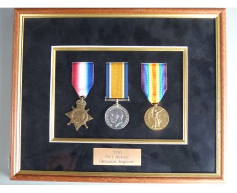 British Army WWI medals comprising 1914/15 Star, War Medal and Victory Medal, named to Pte C Bowyer Gloucestershire Regiment,