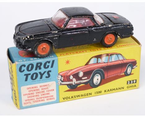 Corgi Toys diecast model Volkswagen 1500 Karmann Ghia with black body and red interior and hubs 239, in original box.&nbsp;