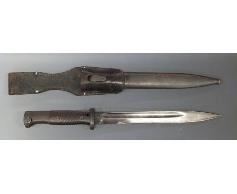 WWII German K98 bayonet stamped 3524 to the 25cm blade with matching number scabbard and leather frog.&nbsp;