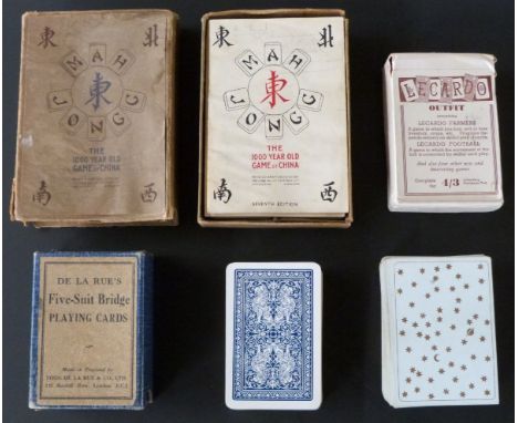 Various English playing card games including five-suit bridge cards, 65 cards, joker and rules in box, c1938, Waddingtons sta