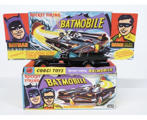 Corgi Toys diecast model Batmobile 1st type with no tow hook, black body, figures, bat logo hubs and nine rockets 267, in ori