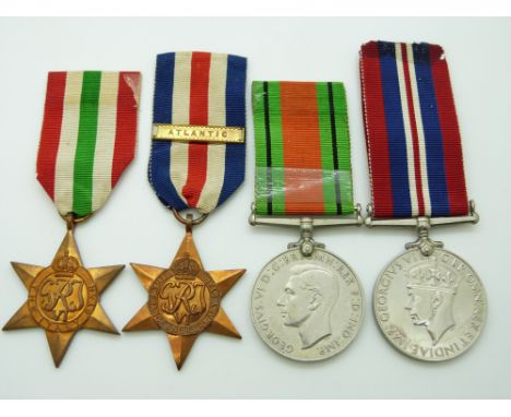 British Army WWII medals comprising the France &amp; Germany Star with Atlantic clasp, the Italy Star, War Medal named to V90