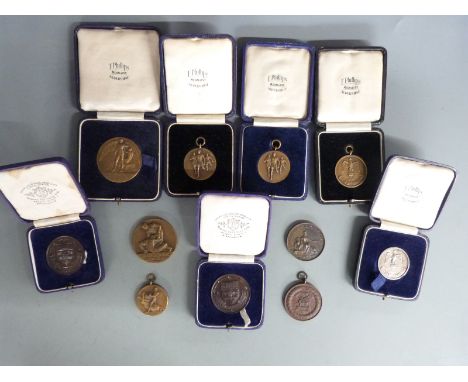 A small collection of sporting / athletics medals including Army Boxing Association Boys Mosquito Weight 1954, Royal Tourname