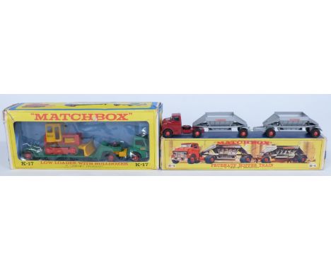 Two Matchbox diecast model vehicles King Size K-17 Low Loader With Bulldozer and Major Pack M-4 Fruehauf Hopper Train, both i