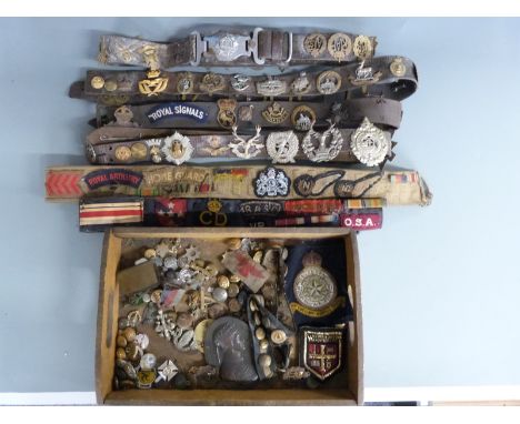 A large collection of military badges mounted on leather belts and loose, includes cloth examples, 31st Squadron, Pioneer Cor