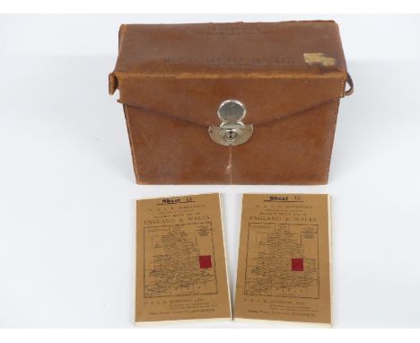 A leather cased set of 25 motor maps of England and Wales by W &amp; AK Johnston, three miles to the inch scale