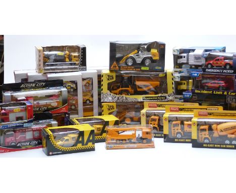 Twenty-seven model construction and emergency vehicles and vehicle sets including JCB, London Series fire engine etc, all in 