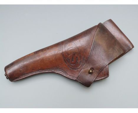 American brown leather pistol or revolver holster with brass lanyard ring stamped to the front US and to the reverse 1918 WD,