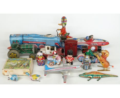 Seventeen tin-plate toys mostly clockwork including a Hornby 0 gauge train, robot, aeroplanes, motorcycle rider etc together 