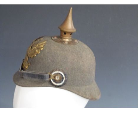 German / Prussian Army 19thc green felt pickelhaube helmet, complete with leather chin strap and leather liner with maker's n