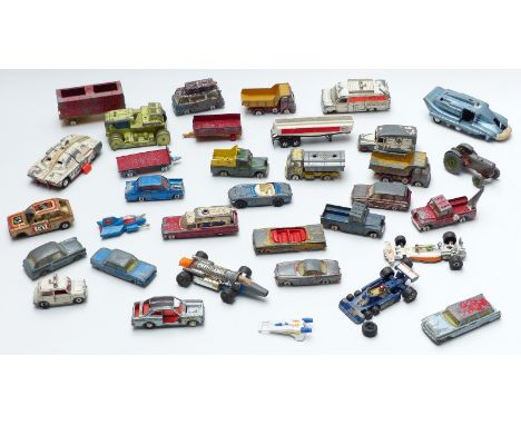 Thirty-four Corgi, Dinky and Spot-On diecast model vehicles including Police, Spectrum Pursuit Vehicles, Chipperfield Circus 