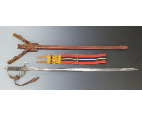 An 1897 pattern infantry officer's sword with shagreen and wire grip, in leather scabbard, the 82cm blade etched Royal Artill