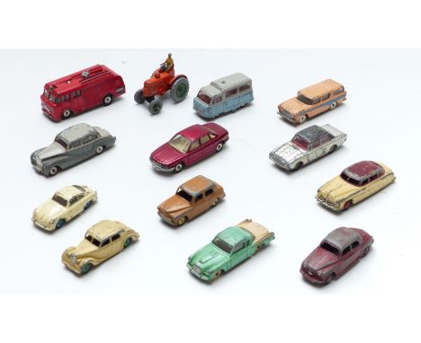 Thirteen Dinky Toys diecast model vehicles including fire engine, tractor, vans, cars etc.&nbsp;