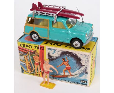 Corgi Toys diecast model car Surfing With The B.M.C. Mini-Countryman with mint green body, lemon interior, surfer and two sur