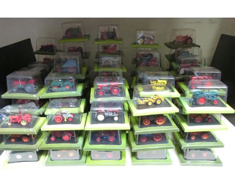 One-hundred Hachette 1:43 scale diecast model tractors, all in original bubble packed boxes.&nbsp;