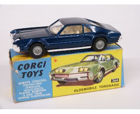 Corgi Toys diecast model Oldsmobile Toronado with metalic blue body and cream interior 264, in original box.&nbsp;