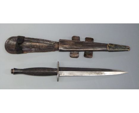 Fairbairn Sykes 3rd pattern fighting knife with 18cm blade stamped 'H Cooper Sheffield England', overall length 29.5cm, in le