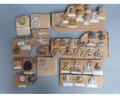 British Army collection of cap badges including Leeds Pals, Gurkhas, 7th Battalion Manchester Regiment, Royal Ulster Rifles, 