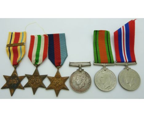 WWII British medals comprising 1939/45 Star, Italy Star, Africa Star with clasp for 1st Army, Defence Medal and two War Medal