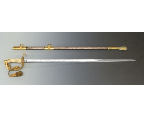 American naval officer's sword with brass hilt, shagreen grip and etched 76cm blade marked USN, Japan Sword Co and J.F. Jones