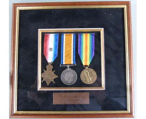 British Army WWI medals comprising 1914 'Mons' Star with silver rosette, War Medal and Victory Medal named to Pte A Harding W