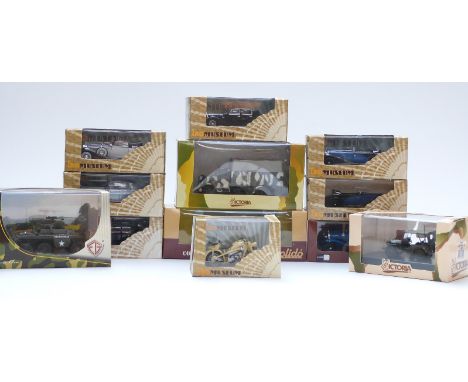 Twelve IXO Museum, Victoria and Solido diecast model vehicles including military tanks etc, all in original display boxes.&nb