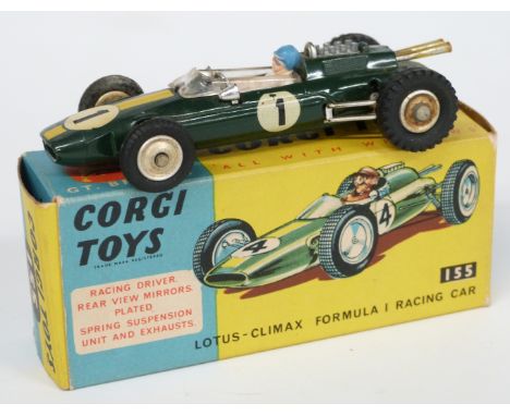 Corgi Toys diecast model Lotus-Climax Formula 1 Racing Car with green body, yellow stripe, white and blue driver and racing n