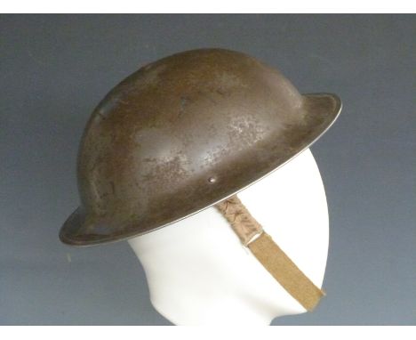 British Army WWII 'Brodie' steel helmet with liner and strap, stamped RO &amp; Co 1939