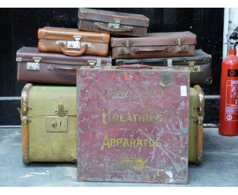 An ash bound trunk and a collection of vintage leather cases, together with a vintage Breathing Apparatus tin