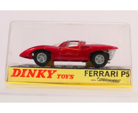Dinky Toys - A boxed Dinky Toys #220 Ferrari P5. The model in metallic red with yellow interior and silver trim appears to be