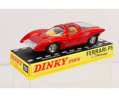 Dinky Toys - A boxed Dinky Toys #220 Ferrari P5. The model in metallic red with yellow interior and silver trim appears to be